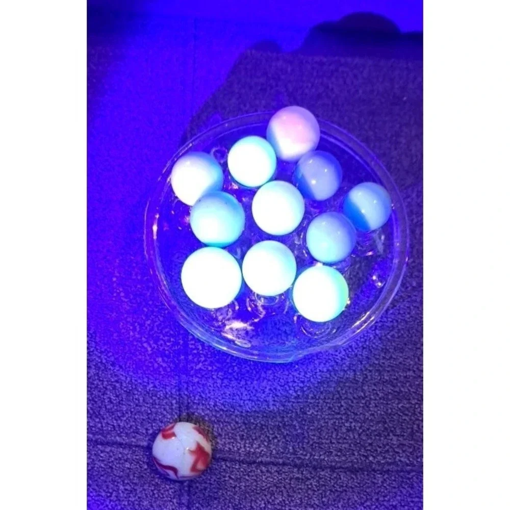 Lot Of 11 Estate Sale Marbles All UV Reactive Plus 1 UV Reactive Shooter Marble.